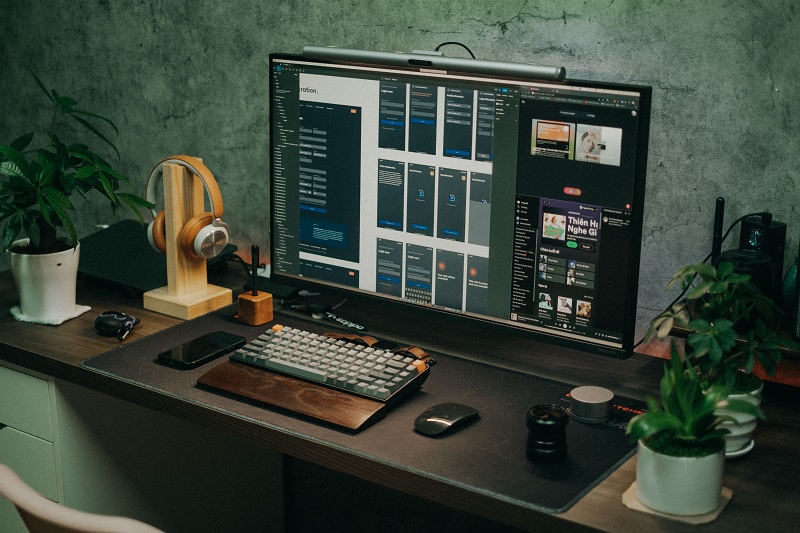 Computer displaying a WordPress website design while changing the site theme without losing content
